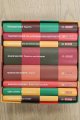 AFRICANON., AfriCanon. Acht delen in box: met de volgende boeken  1) Doris Lessing: Het zingende gras 2) Ahmadou Kourouma: Allah is niet verplicht 3) Yvonne Vera: Vuurvlinder 4) Marlene Van Niekerk: Triomf 5) Nagieb Mahfoez: Kinderen van Gabalawi 6) Chinua Achebe: Een wereld valt uiteen 7) Nuruddin Farah: Kaarten 8) Tahar ben Jallooun: Een verblindende afwezigheid van licht