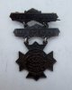 1897 Marksman Pin to Sergt (Sergeant) J.H. Mills